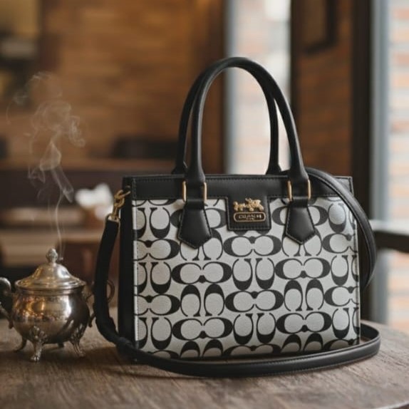 Coach Handbag with Lock Closure